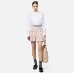 Elisabetta Franchi Skirts|Bouclé wool miniskirt with pockets in technical voile fabric Latex