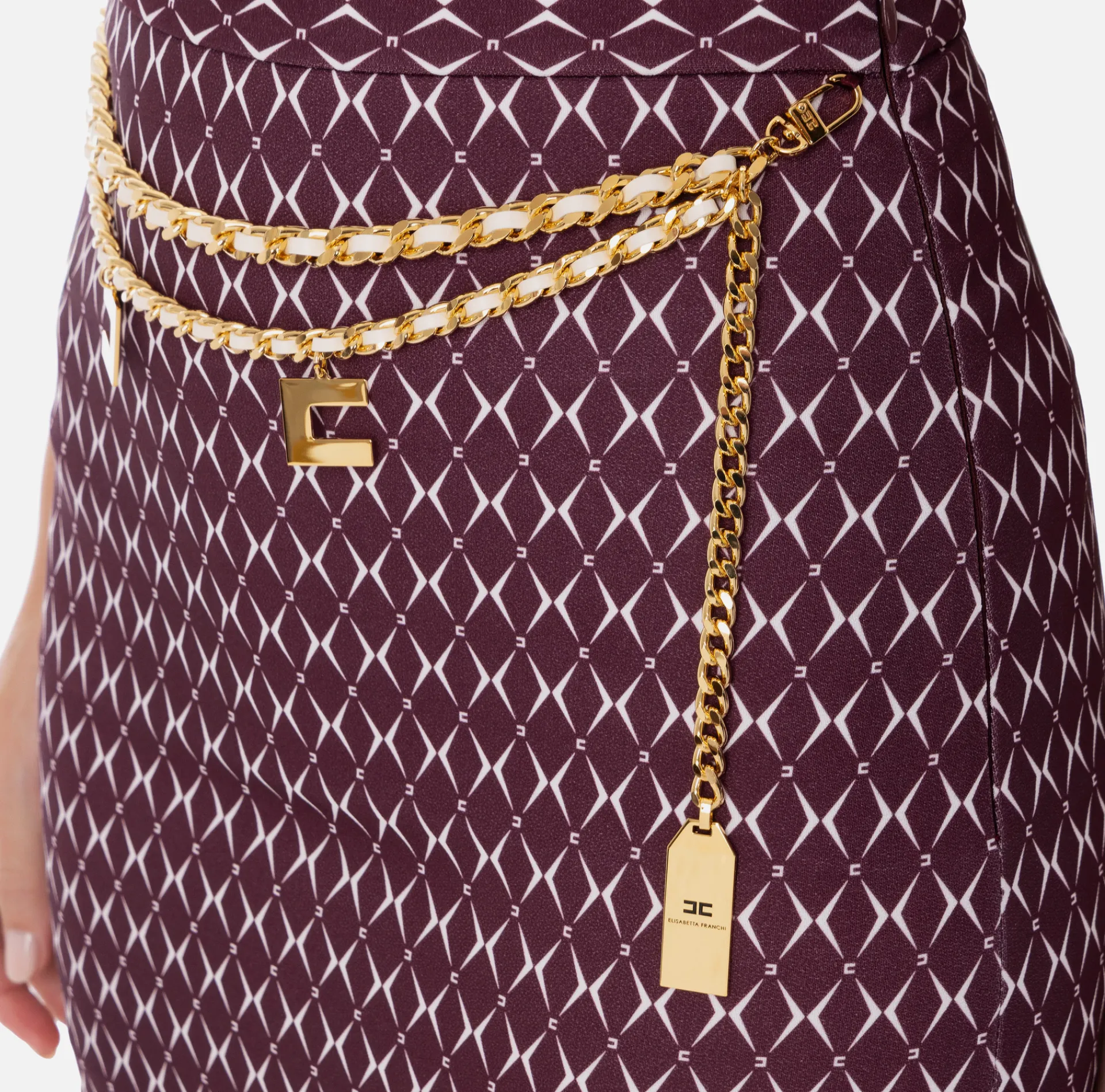 Elisabetta Franchi Tailleur|Skirts|Crêpe miniskirt with diamond print and chain RougeNoir/Butter